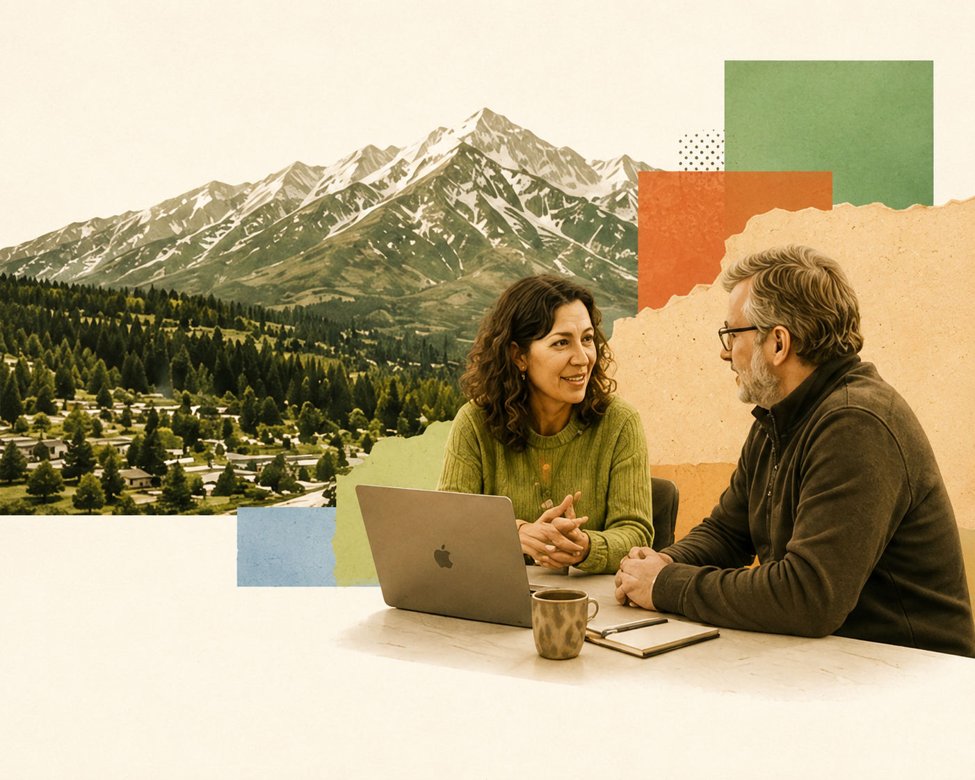 Two people talking over a laptop, Roaring Fork Valley mountains behind them